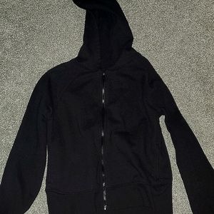 I am selling a girls black zip-up hoodie.